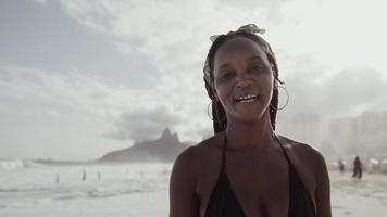 Latin young girl, famous beach Rio de Janeiro, Brazil. Latin summer vacation holiday. photo