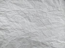 Crumpled paper texture. Crumpled paper isolated on white background photo