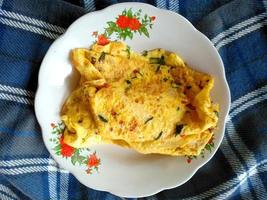 Omelet on the place. Indonesian Street Food photo