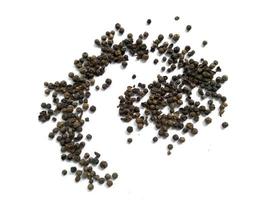 Black pepper on white background photo