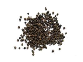 Black pepper on white background photo