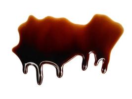 Texture of spilled soy sauce. Soy sauce on white background. Spilled soy sauce sauce puddle isolated on white background photo