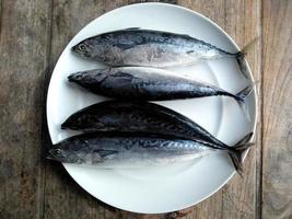 Fresh fish on the plate. Indonesian culinary Food photo