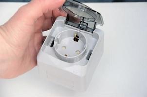 socket for conducting electricity and connecting devices in the hand photo