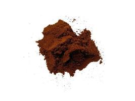 Coffee powder on white background photo