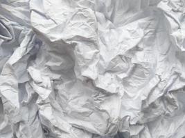 Crumpled paper texture. Crumpled paper isolated on white background photo