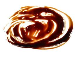 Texture of spilled soy sauce. Soy sauce on white background. Spilled soy sauce sauce puddle isolated on white background photo