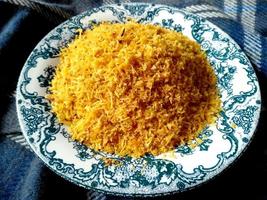 Coconut fruit cooking on the plate. Indonesian culinary Food photo