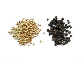 Coriander seeds and Black pepper on white background photo