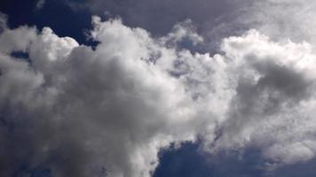 picture of white cloud sky on a hot day photo