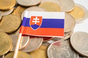 Stack of coins money with Slovakia flag, finance banking concept. photo