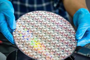 Silicon wafer for manufacturing semiconductor of integrated circuit. photo