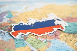 Bangkok, Thailand - February 1, 2022 Russia flag on world map background. photo