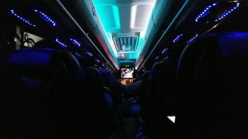 Time lapse of inside bus view with neon light