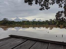 Enjoy the view on the banks of the river, Kalimantan, Indonesia photo