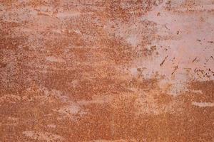 Weathered rusty metal surface background. photo
