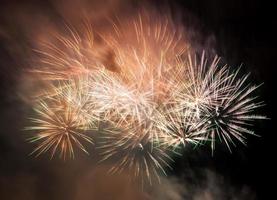 Spectacular fireworks show light up the sky. New year celebration. photo