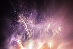 Spectacular fireworks show light up the sky. New year celebration. photo