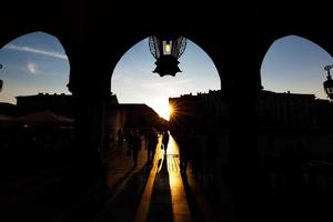 Tourists on the main market square in Cracow photo