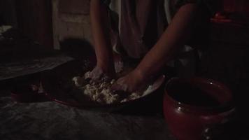 Adult Kneads Bread Dough in Large Red Bowl video