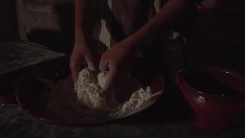 Hands Mix Dry Bread Ingredients in a Large Bowl Before Adding Water video