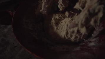 Hands Toss Mix and Knead Bread Dough in Large Bowl video