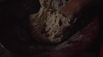 Close Up of Hands Kneading Bread Dough in Slow Motion video