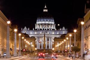 Vatican City. St. Peters Basilica at night. photo