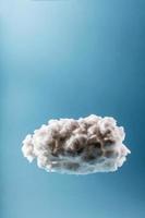 Single cloud on a light blue background. photo