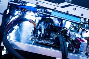 Wires of bitcoin mining machine in a close-up shot. photo