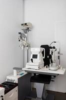 Optician's exam room with professional machines. photo