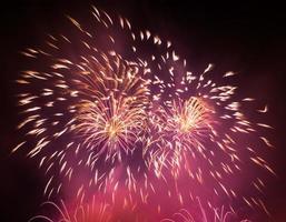 Spectacular fireworks show light up the sky. New year celebration. photo