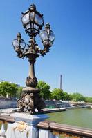 Paris, France, 2022 - Eiffel Tower and bridge on Seine river in Paris, Fance. photo