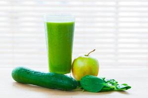 Fresh juice from green vegetables and fruits. Healthy vitamin drink. photo