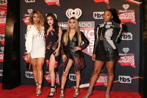 los angeles, 5 de marzo - quinta armonía, dinah jane, lauren jauregui, ally brooke, normani kordei en los iheart music awards 2017 en el foro el 5 de marzo de 2017 en los angeles, ca foto