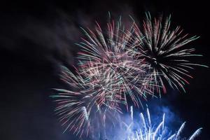 Spectacular fireworks show light up the sky. New year celebration. photo