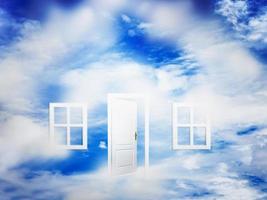 Open door on blue sunny sky. New life, success, hope. photo