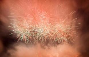 Spectacular fireworks show light up the sky. New year celebration. photo