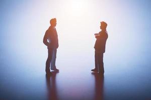 Two man standing face to face. photo