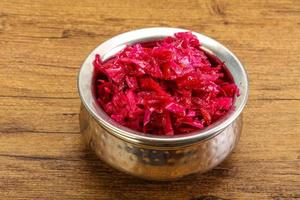 Marinated red cabbage in the bowl photo