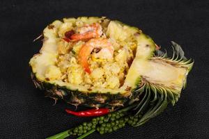 Fried rice with pineapple and prawns photo