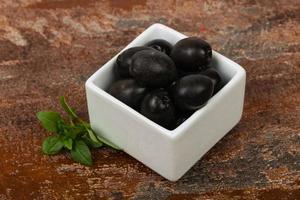 Black olives in the bowl photo