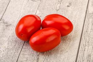 Red bright tasty tomato heap photo