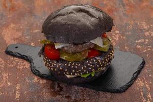 Tasty black burger photo