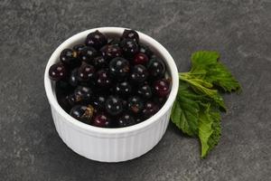 Fresh ripe sweet black currant photo