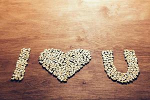 I love you symbol made from wooden hearts. photo