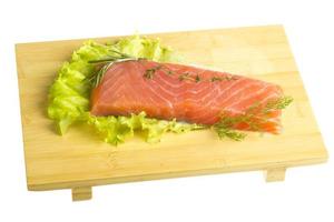 Salmon fillet garnished photo