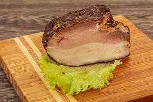 Homemade Smoked pork peat with spices photo
