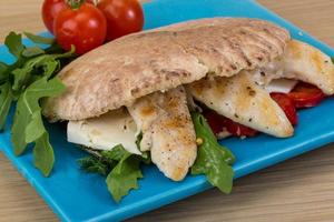 Pita with ruccola and chicken photo