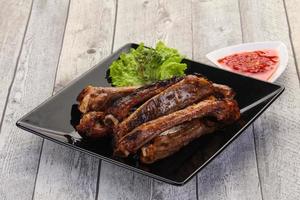 Roasted pork ribs photo